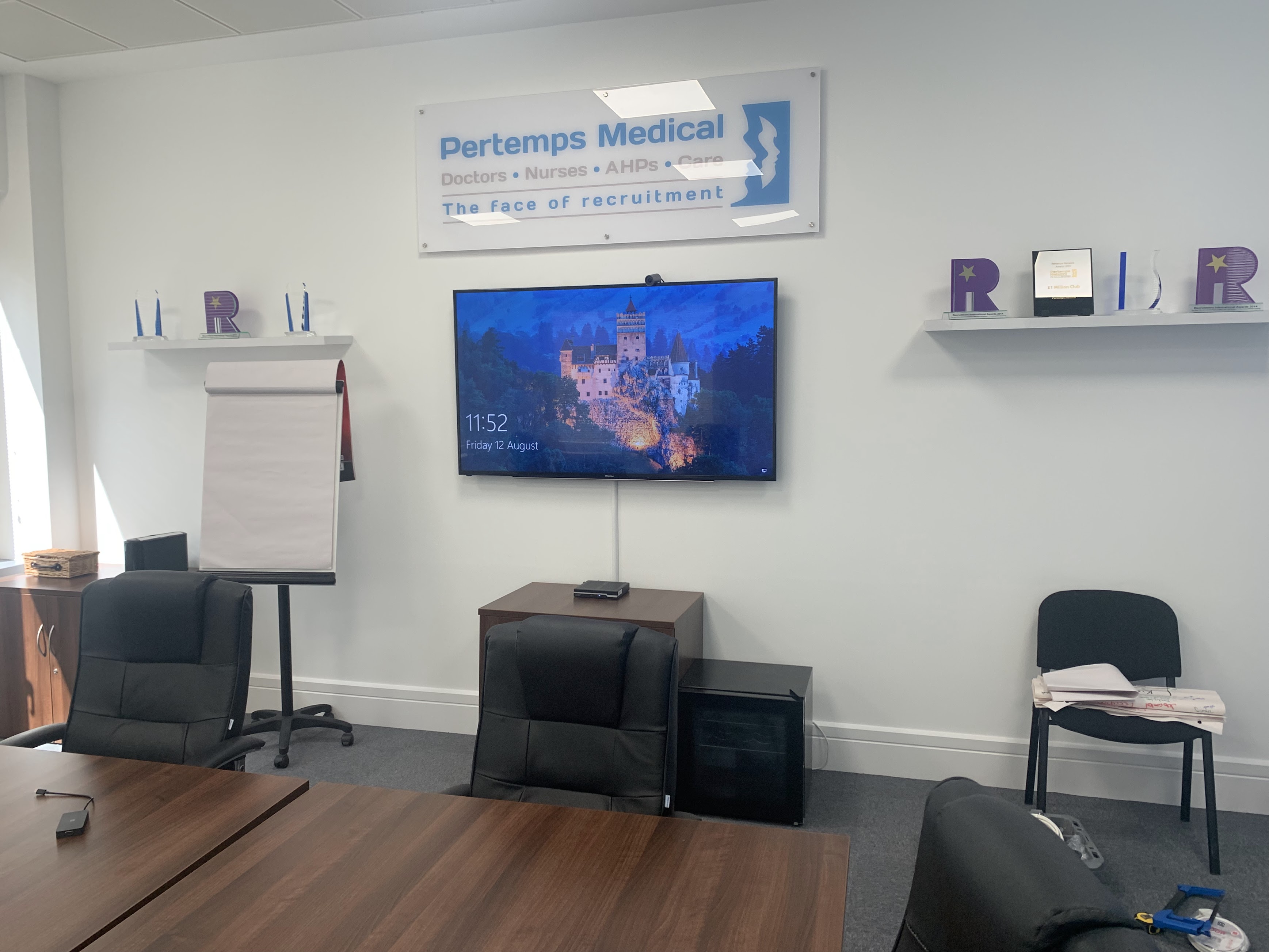 Commercial TV wall mounting in office boardroom in Milton Keynes