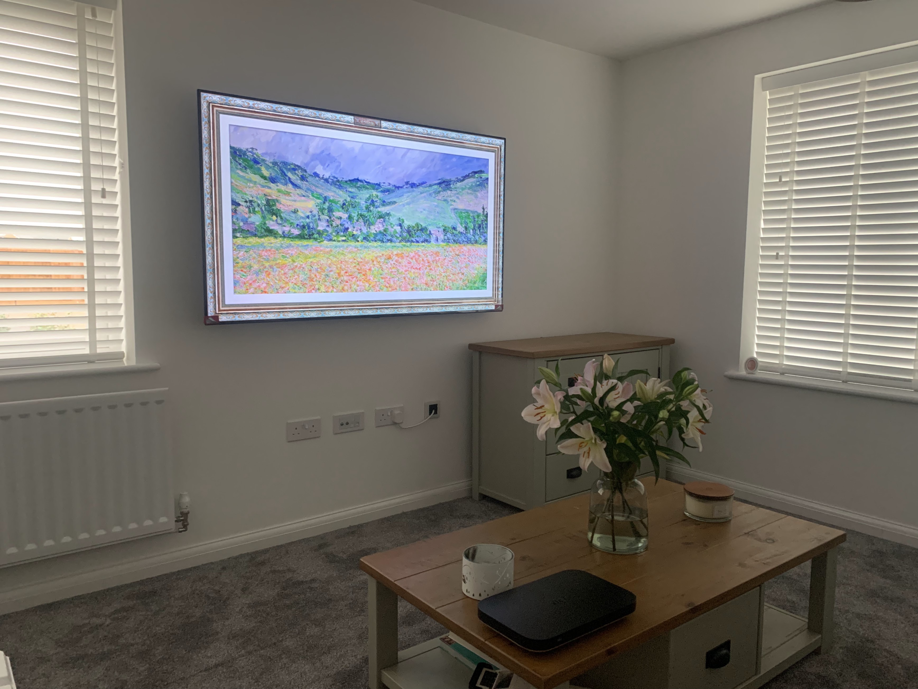 Samsung Frame TV wall mounted in stylish living room in Milton Keynes